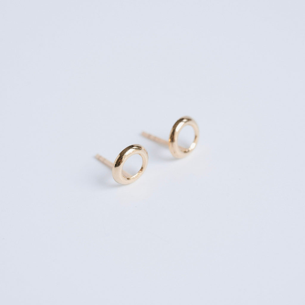 open circle gold stud earrings