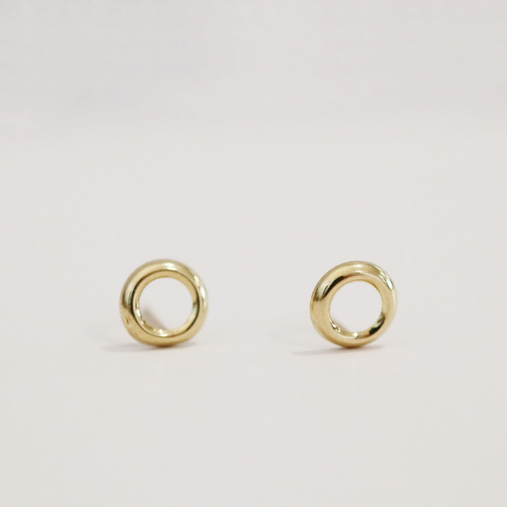 Dainty circle studs in 14k yellow gold