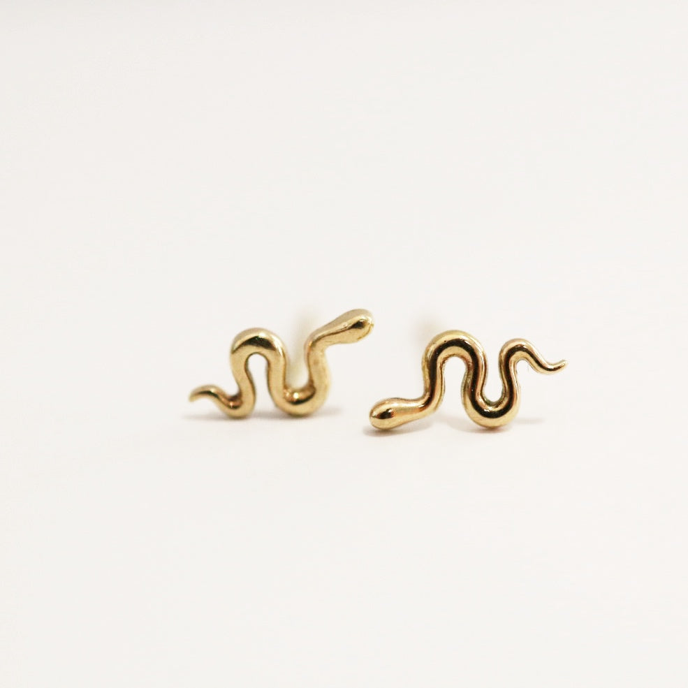 tiny snake stud earrings in 14karat yellow gold
