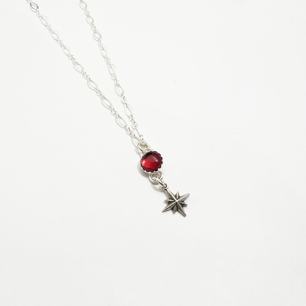 sterling silver garnet and star necklace
