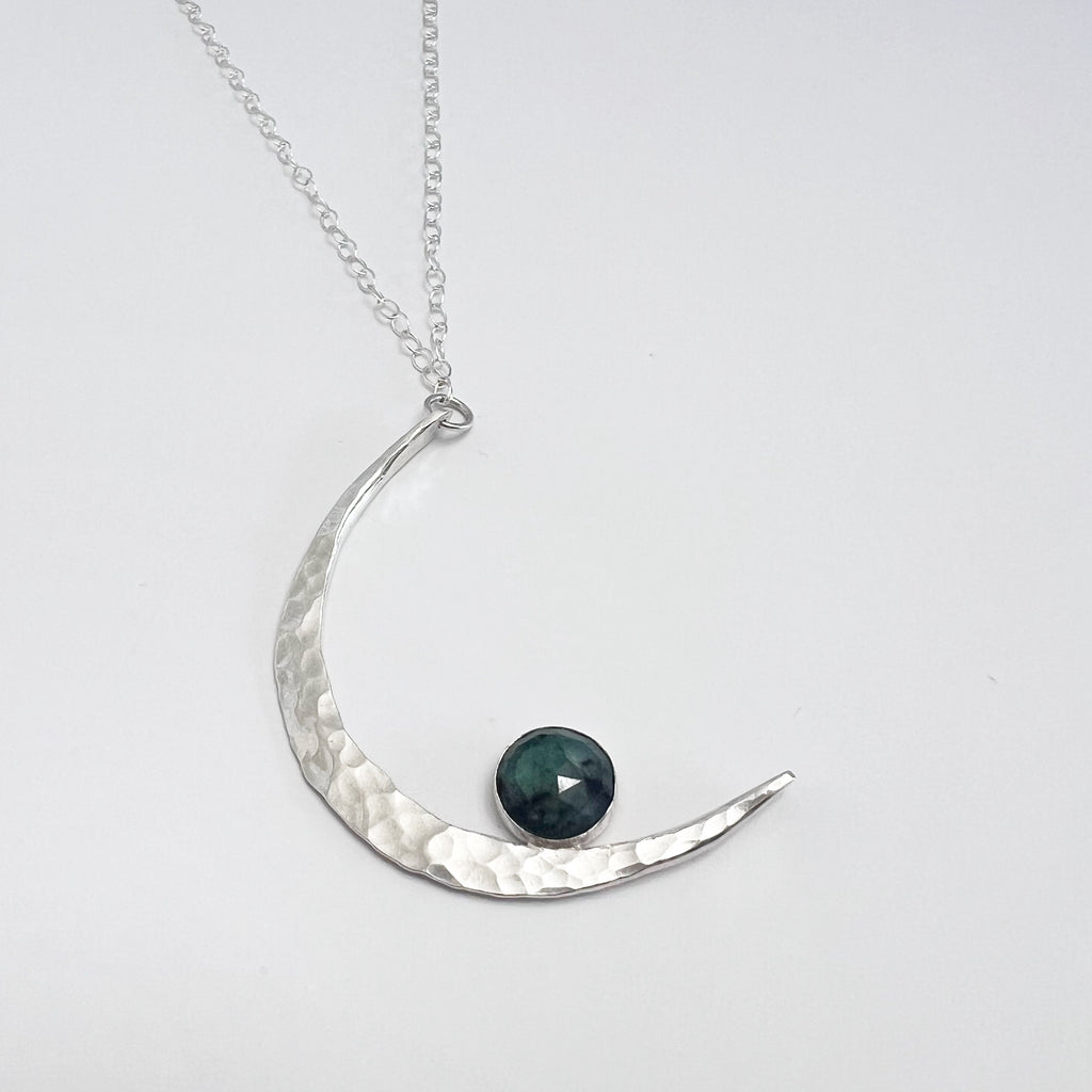 hammered moon necklace with sterling silver and emerald